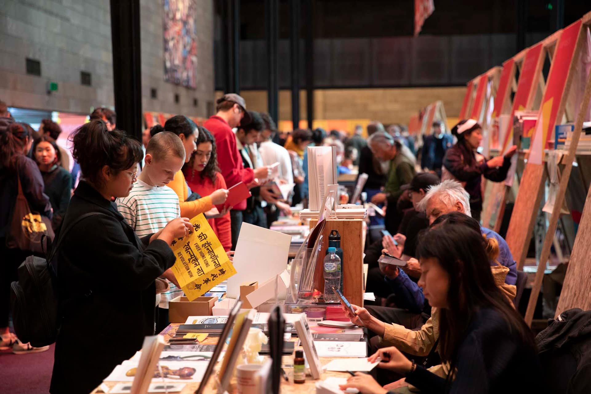 Patrons exploring the Melbourne Art Book Fair, NGV Great Hall, Melbourne Art Book Fair 2020. Photo: Tobias Titz